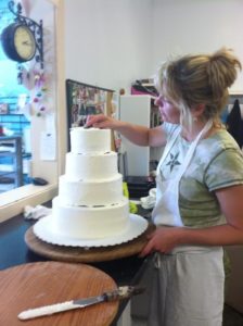 Erica making wedding cake
